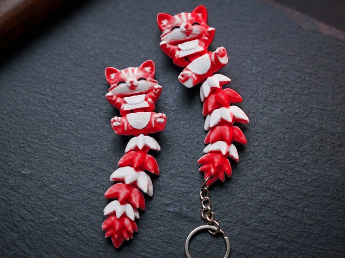 Translucent Red flexi cat keychain