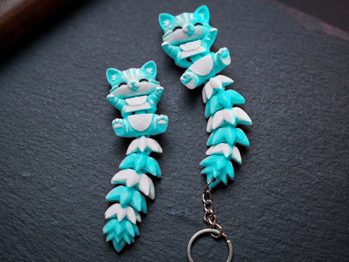 Turquoise flexi cat keychain